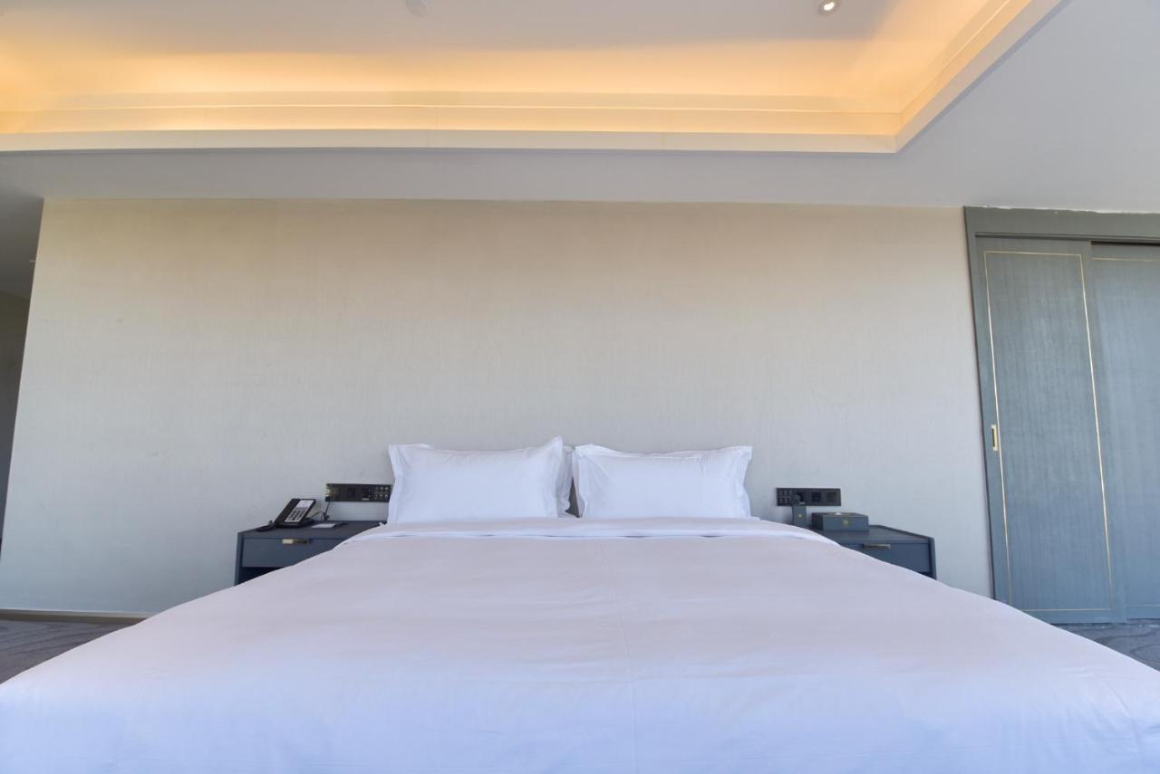 Ximala Business Hotel Guangzhou Bagian luar foto