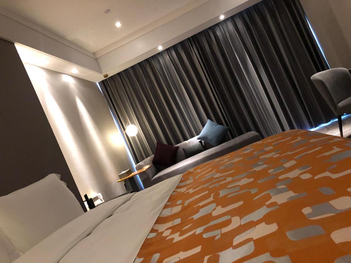Ximala Business Hotel Guangzhou Bagian luar foto