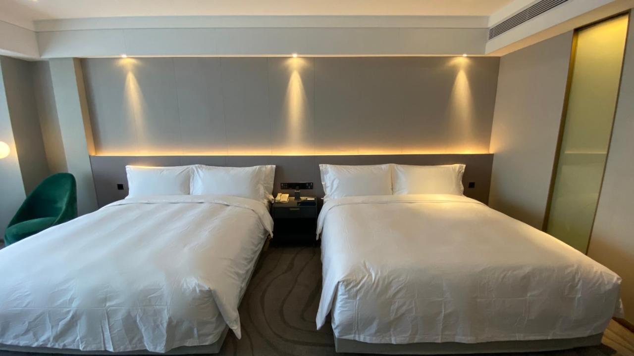 Ximala Business Hotel Guangzhou Bagian luar foto