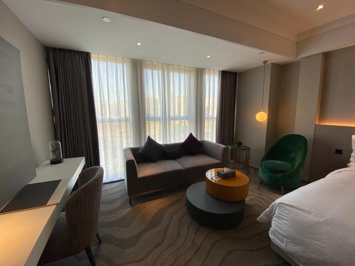 Ximala Business Hotel Guangzhou Bagian luar foto