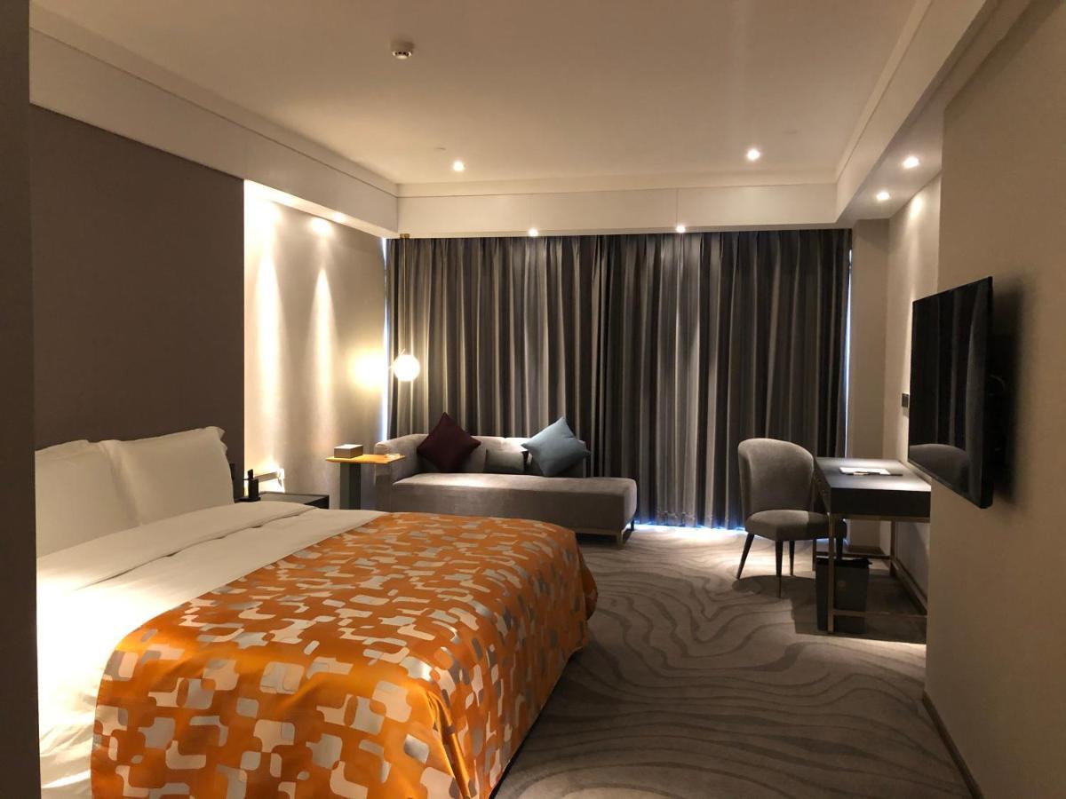 Ximala Business Hotel Guangzhou Bagian luar foto