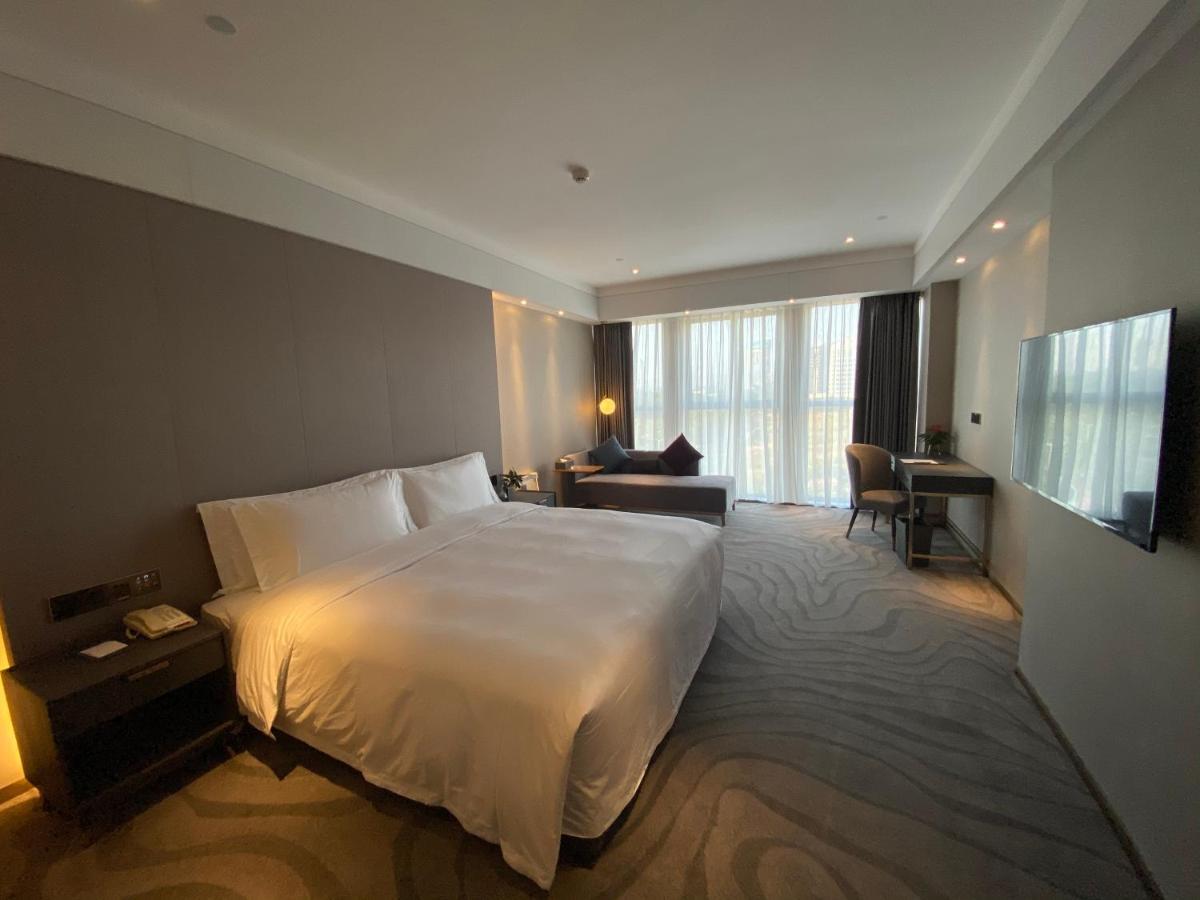 Ximala Business Hotel Guangzhou Bagian luar foto
