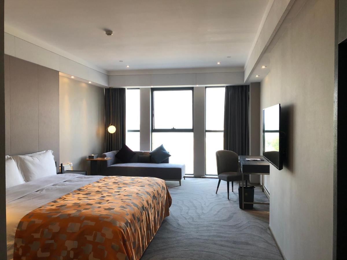 Ximala Business Hotel Guangzhou Bagian luar foto