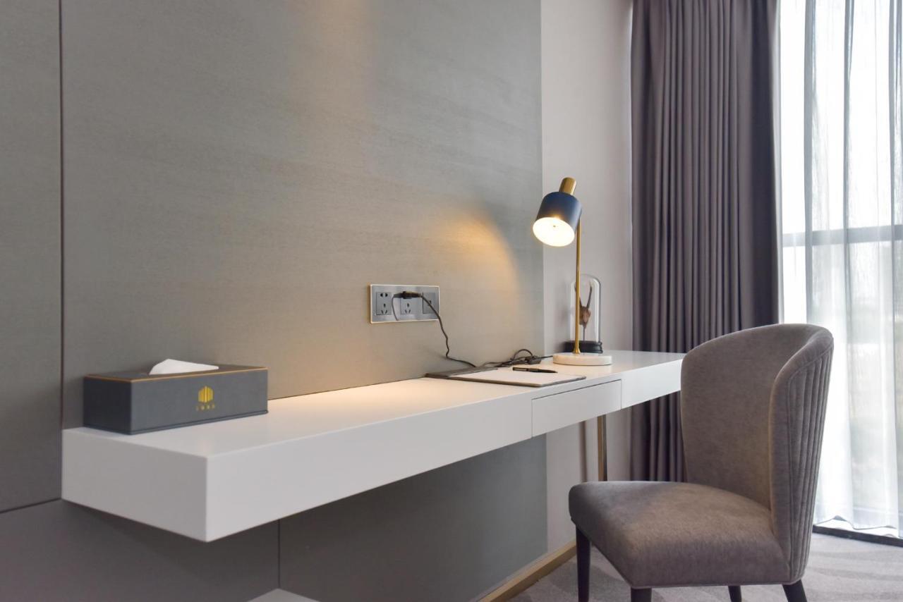 Ximala Business Hotel Guangzhou Bagian luar foto