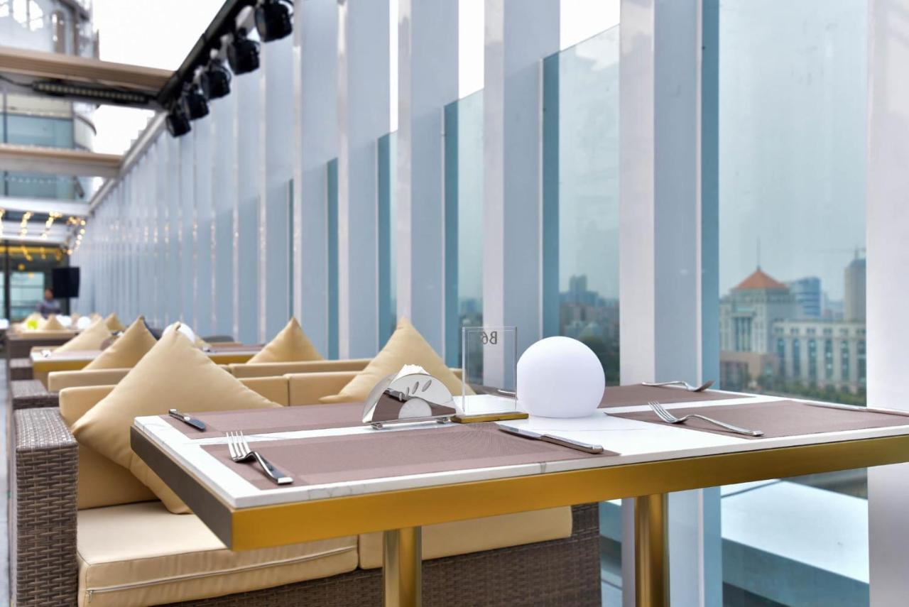 Ximala Business Hotel Guangzhou Bagian luar foto
