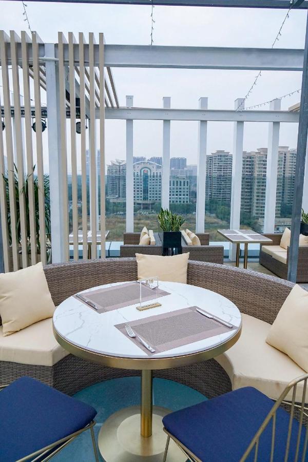 Ximala Business Hotel Guangzhou Bagian luar foto